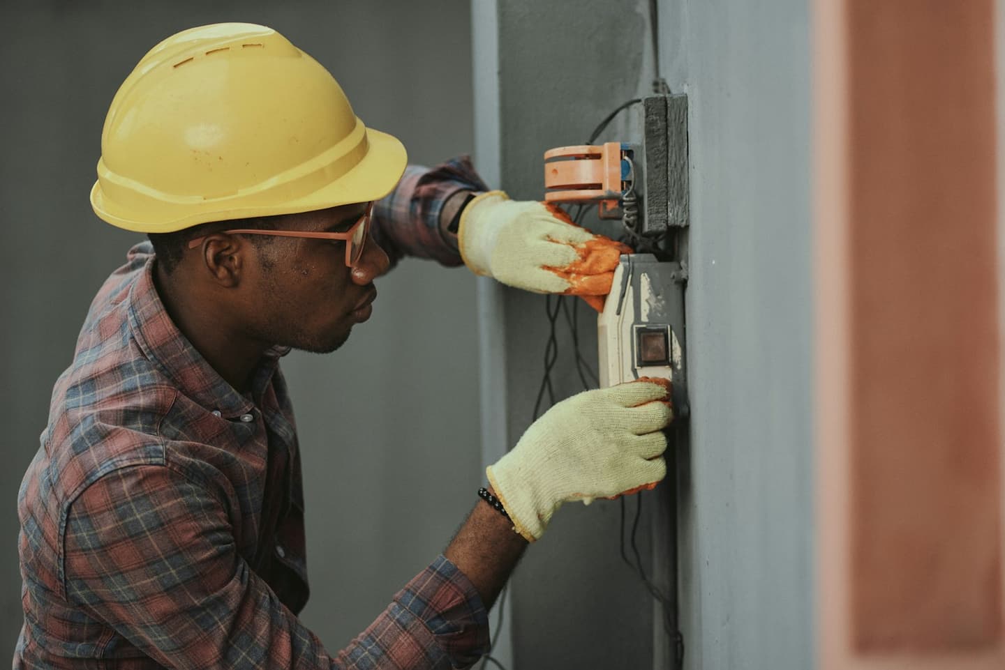 Licensed electrician wiring residential panel circuitry