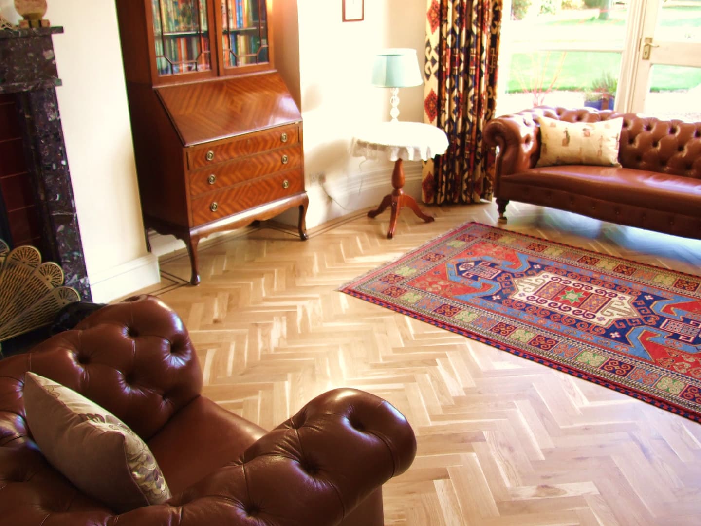 Handcrafted French oak herringbone hardwood floor installation